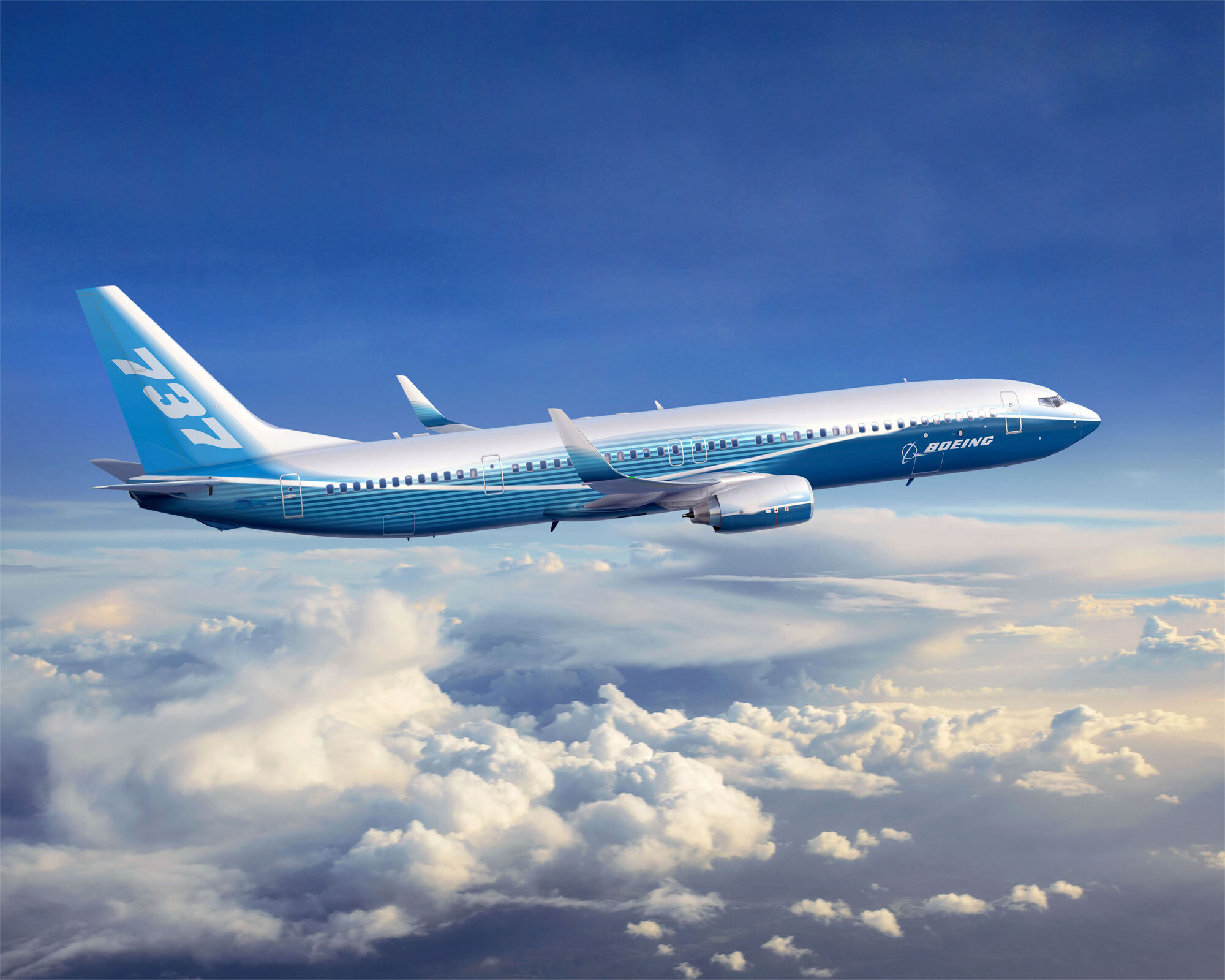 A Boeing 737 in flight above the clouds